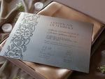 Load image into Gallery viewer, Certificate of marriage with decorative elements on a soft fabric background